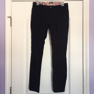 Black distressed jeans.